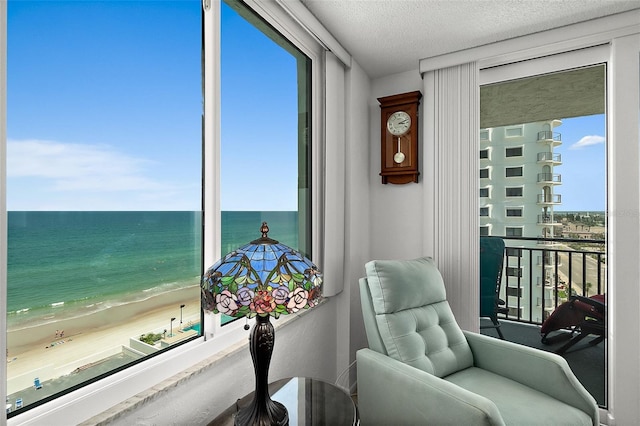2987 S Atlantic Ave Unit 901, Daytona Beach, FL 32118 - living area featuring view of water and beach
