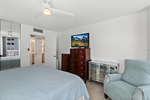 2987 S Atlantic Ave Unit 901, Daytona Beach, FL 32118 - carpeted bedroom featuring ceiling fan
