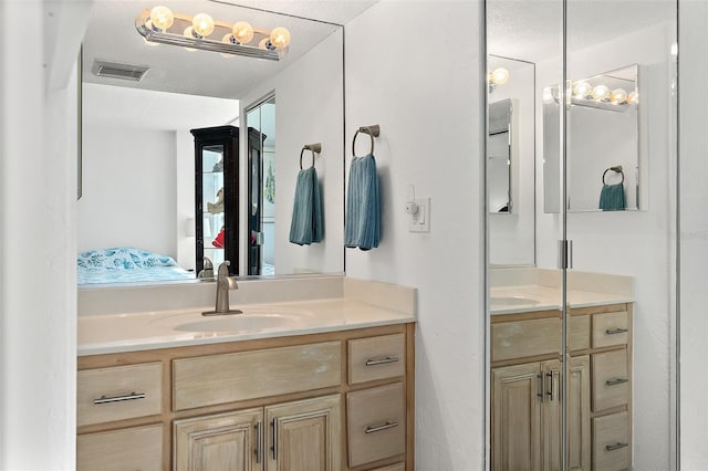 2987 S Atlantic Ave Unit 901, Daytona Beach, FL 32118 - ensuite bathroom featuring vanity