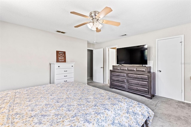 833 Lucerne Cir, Ormond Beach, FL 32174 - bedroom with carpet floors and a ceiling fan
