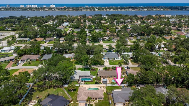 833 Lucerne Cir, Ormond Beach, FL 32174 - aerial view of property and surrounding area with nearby suburban area, a nearby body of water, and a pool area