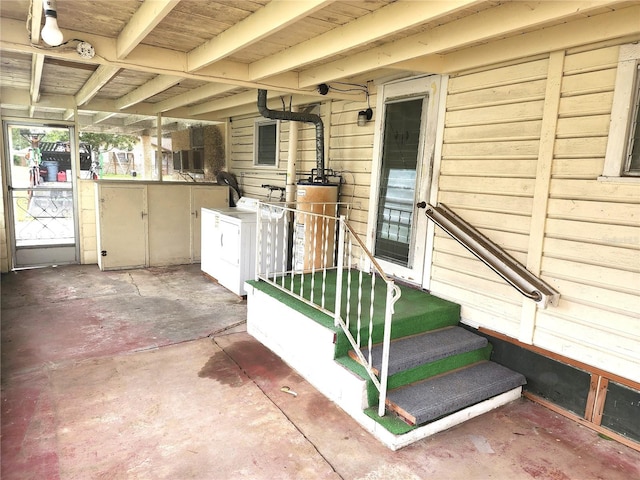2647 Brookline Ave, New Smyrna Beach, FL 32168 - view of patio with water heater and washing machine and dryer