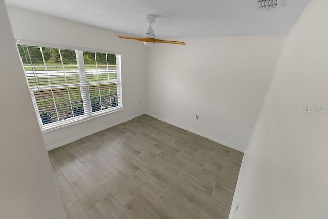 1092 Gage Ave, Deltona, FL 32738 - unfurnished room with baseboards and ceiling fan