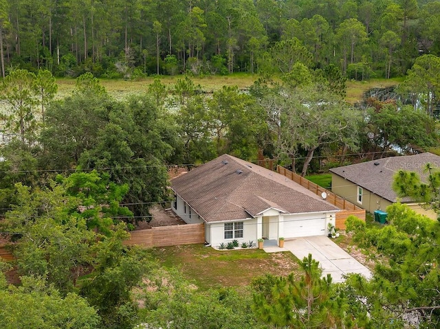 1092 Gage Ave, Deltona, FL 32738 - aerial view of property and surrounding area featuring a heavily wooded area