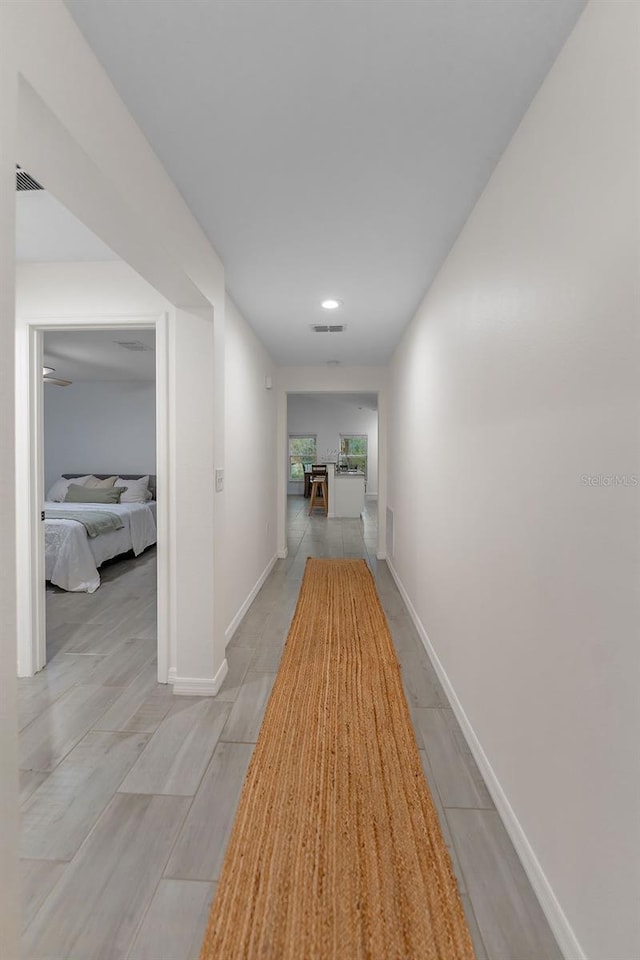 1092 Gage Ave, Deltona, FL 32738 - hallway featuring baseboards and recessed lighting