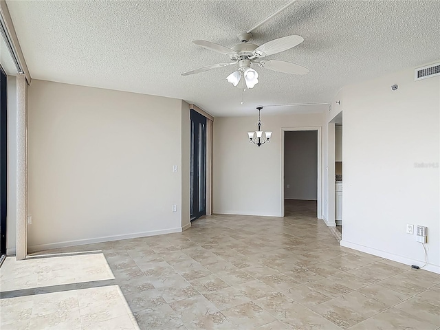 1 Oceans W Blvd Unit 2A1, Daytona Beach, FL 32118 - unfurnished room featuring ceiling fan, a textured ceiling, a chandelier, and baseboards