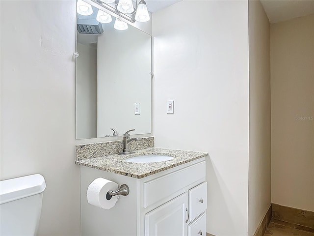 1 Oceans W Blvd Unit 2A1, Daytona Beach, FL 32118 - bathroom featuring toilet and vanity