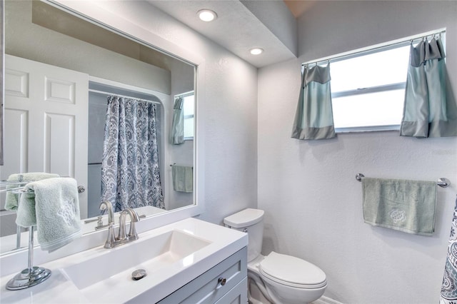 721 Laurel Bay Cir, New Smyrna Beach, FL 32169 - full bathroom featuring toilet, vanity, and a shower with shower curtain