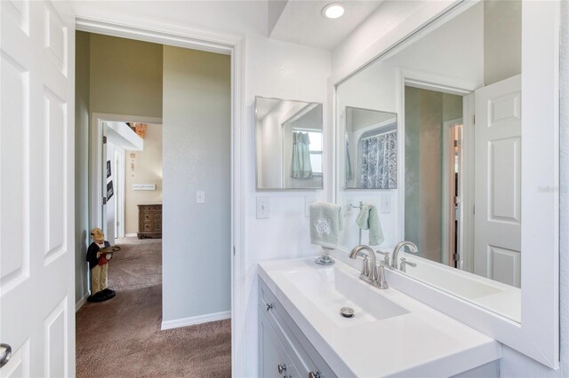 721 Laurel Bay Cir, New Smyrna Beach, FL 32169 - bathroom with vanity and baseboards