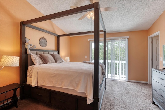 721 Laurel Bay Cir, New Smyrna Beach, FL 32169 - carpeted bedroom featuring a textured ceiling, access to exterior, vaulted ceiling, ceiling fan, and baseboards
