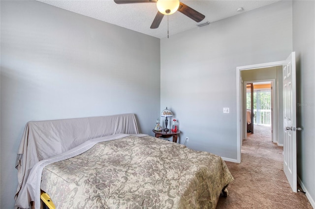721 Laurel Bay Cir, New Smyrna Beach, FL 32169 - bedroom with carpet, baseboards, and a ceiling fan