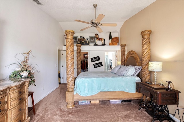 721 Laurel Bay Cir, New Smyrna Beach, FL 32169 - bedroom featuring carpet floors, vaulted ceiling, ceiling fan, and a textured ceiling