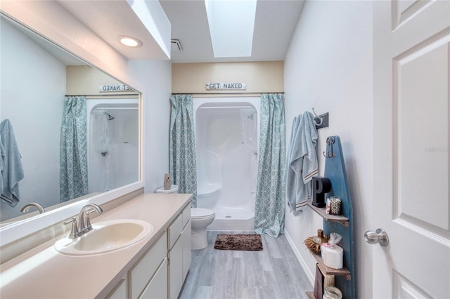 721 Laurel Bay Cir, New Smyrna Beach, FL 32169 - full bath featuring vanity, wood finished floors, toilet, and a shower with curtain