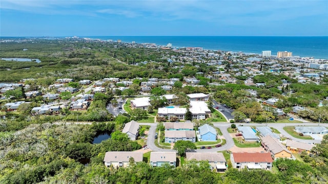 721 Laurel Bay Cir, New Smyrna Beach, FL 32169 - aerial overview of property's location with a large body of water and nearby suburban area