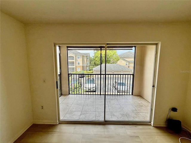 940 Village Trl Unit 8-205, Port Orange, FL 32127 - tiled empty room with baseboards