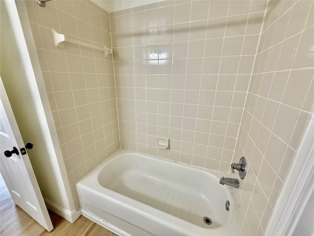 940 Village Trl Unit 8-205, Port Orange, FL 32127 - full bath featuring wood finished floors and  shower combination