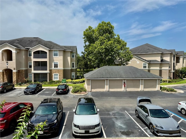 940 Village Trl Unit 8-205, Port Orange, FL 32127 - view of uncovered parking lot