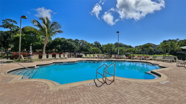 940 Village Trl Unit 8-205, Port Orange, FL 32127 - community pool featuring a patio