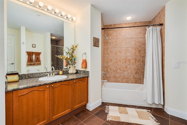 2 Oceans W Blvd Unit 305, Daytona Beach, FL 32118 - full bath with tile patterned flooring, shower / tub combo, and vanity