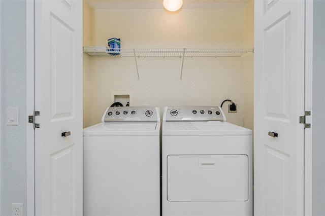 2 Oceans W Blvd Unit 305, Daytona Beach, FL 32118 - laundry area with washing machine and dryer