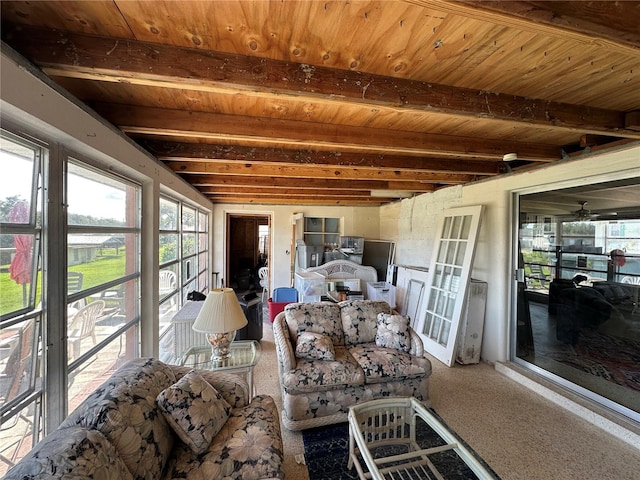 29146 Tamayo Dr, Punta Gorda, FL 33982 - sunroom featuring plenty of natural light, wooden ceiling with exposed beams, and carpet
