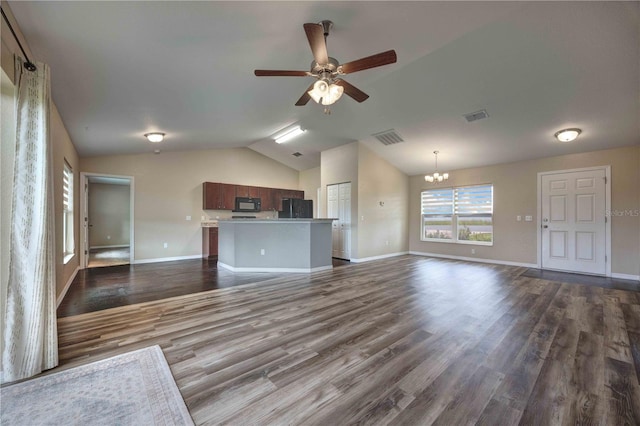 6 Laurel Pass Ct, Ocala, FL 34480 - unfurnished living room with ceiling fan, dark wood-style flooring, baseboards, vaulted ceiling, and a chandelier
