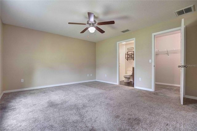 6 Laurel Pass Ct, Ocala, FL 34480 - unfurnished bedroom featuring carpet floors, baseboards, a spacious closet, and connected bathroom