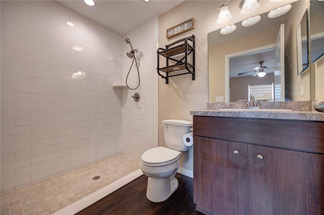 6 Laurel Pass Ct, Ocala, FL 34480 - full bathroom featuring toilet, tiled shower, wood finished floors, and vanity