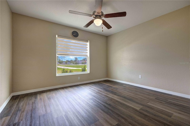 6 Laurel Pass Ct, Ocala, FL 34480 - spare room with dark wood finished floors, baseboards, and ceiling fan