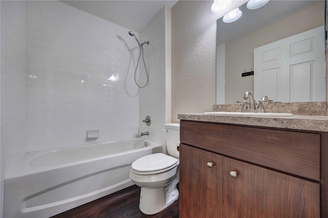 6 Laurel Pass Ct, Ocala, FL 34480 - bathroom featuring toilet,  shower combination, wood finished floors, vanity, and a textured wall