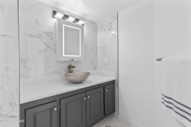 3047 S Atlantic Ave Unit 1805, Daytona Beach, FL 32118 - bathroom with vanity and marble finish flooring