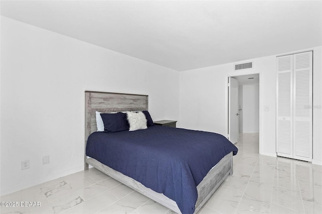 3047 S Atlantic Ave Unit 1805, Daytona Beach, FL 32118 - bedroom featuring light marble finish flooring and baseboards