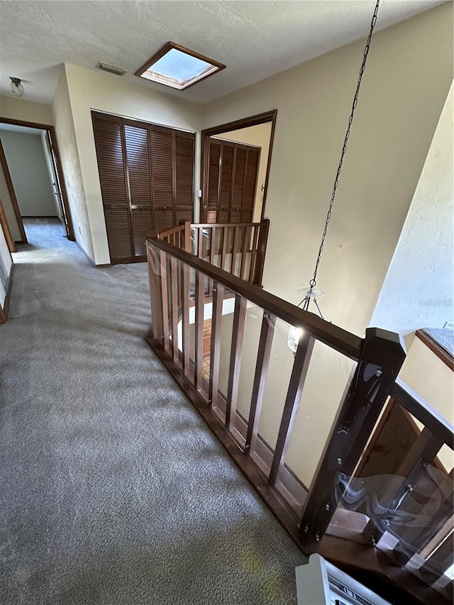 96 Old Barn Trl, Ormond Beach, FL 32174 - staircase with carpet and a textured ceiling