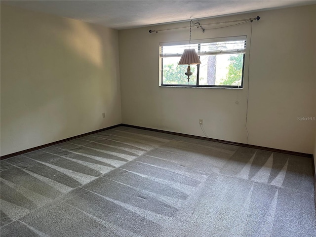96 Old Barn Trl, Ormond Beach, FL 32174 - empty room with carpet flooring and baseboards