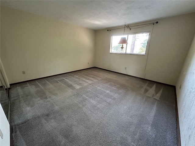 96 Old Barn Trl, Ormond Beach, FL 32174 - carpeted empty room featuring baseboards