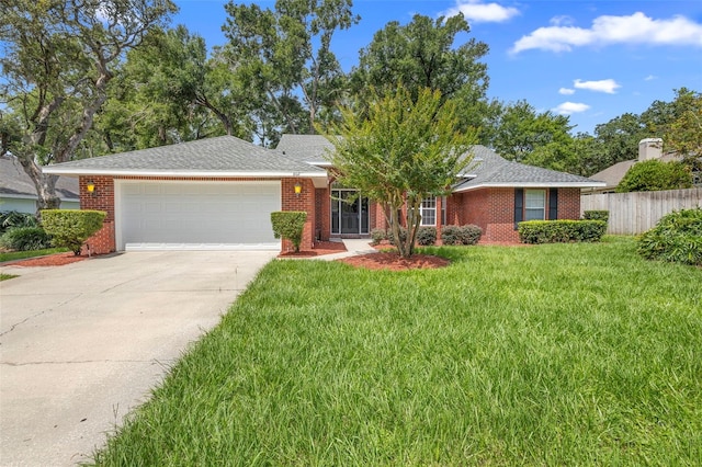 802 Royal Oak Ct, Deland, FL 32724 - ranch-style home featuring a garage, concrete driveway, and brick siding