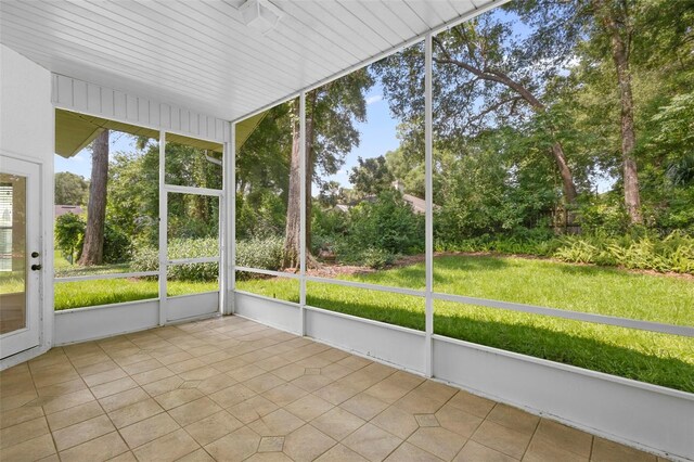 802 Royal Oak Ct, Deland, FL 32724 - unfurnished sunroom with view of wooded area
