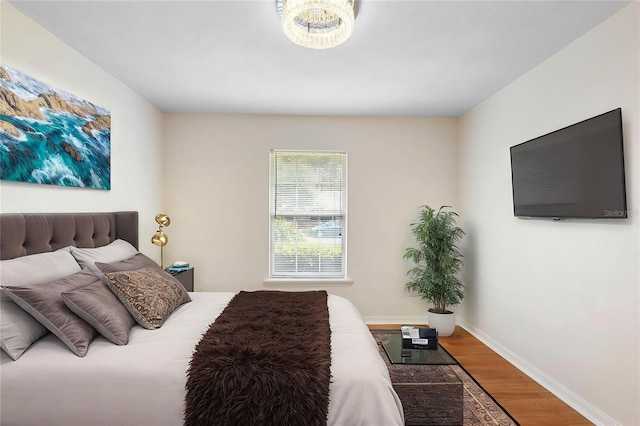 802 Royal Oak Ct, Deland, FL 32724 - bedroom featuring wood finished floors and baseboards