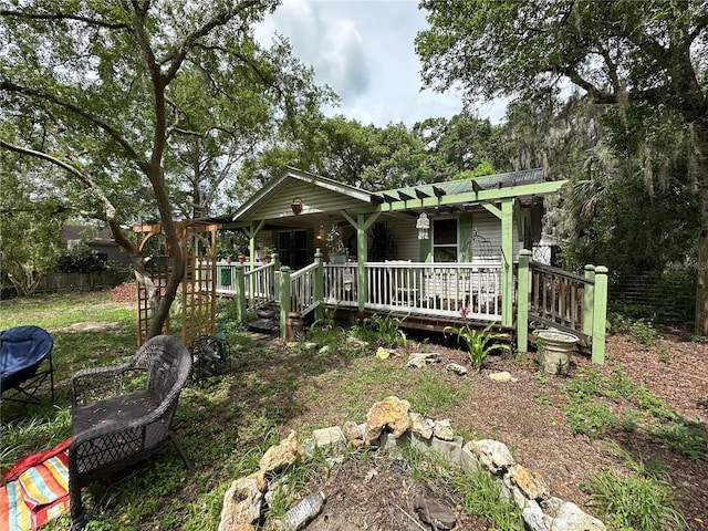 43721 State Road 19, Altoona, FL 32702 - view of front facade featuring covered porch and metal roof