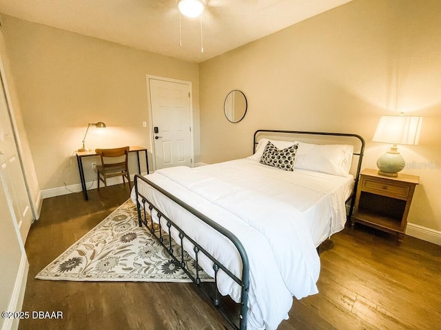 404 S Ridgewood Ave, Daytona Beach, FL 32114 - bedroom with wood finished floors and baseboards