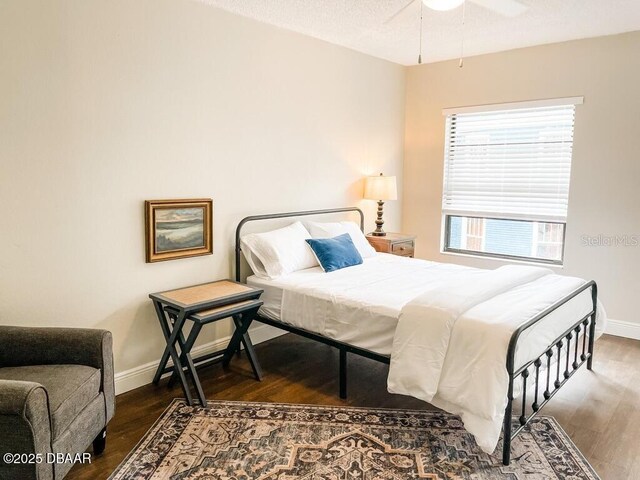 404 S Ridgewood Ave, Daytona Beach, FL 32114 - bedroom featuring wood finished floors and baseboards