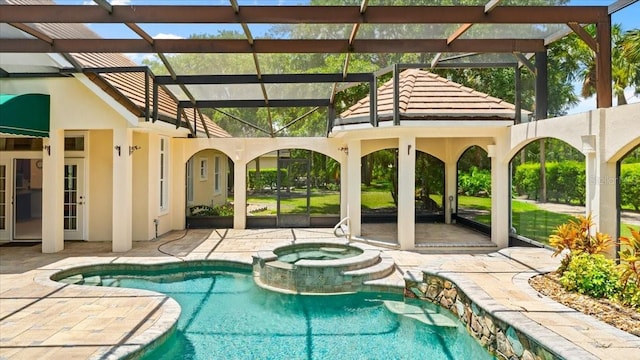 1324 Dovercourt Ln, Ormond Beach, FL 32174 - view of swimming pool featuring a patio, a lanai, and a pool with connected hot tub