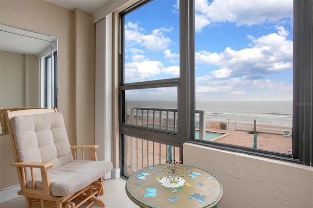3043 S Atlantic Ave Unit 204, Daytona Beach, FL 32118 - sunroom / solarium featuring a water view