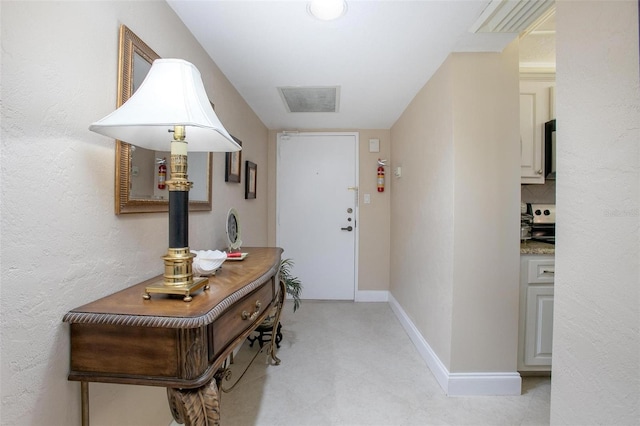 3043 S Atlantic Ave Unit 204, Daytona Beach, FL 32118 - corridor featuring baseboards