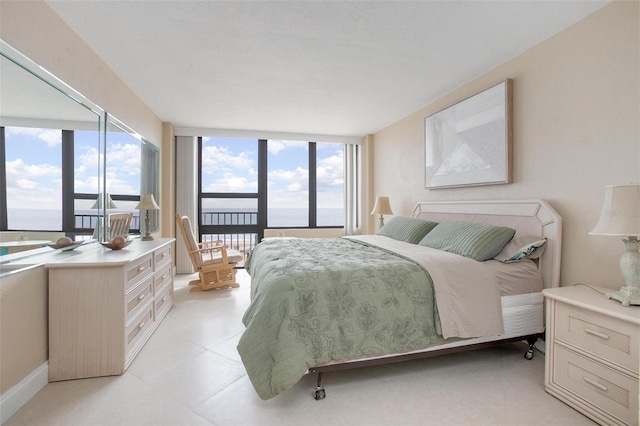 3043 S Atlantic Ave Unit 204, Daytona Beach, FL 32118 - bedroom featuring a water view