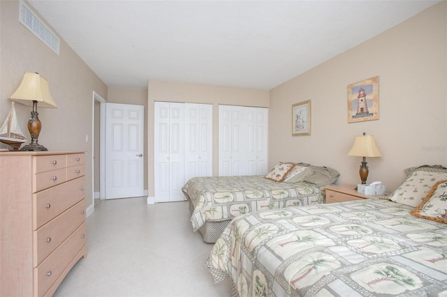 3043 S Atlantic Ave Unit 204, Daytona Beach, FL 32118 - bedroom featuring multiple closets