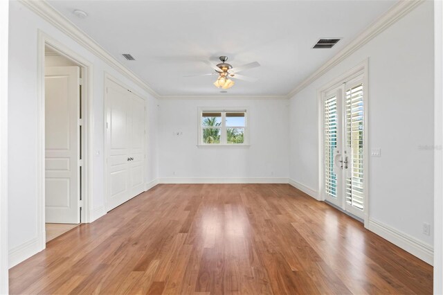 2275 Genesea Ln, Vero Beach, FL 32963 - spare room with light wood-type flooring, ceiling fan, ornamental molding, and baseboards