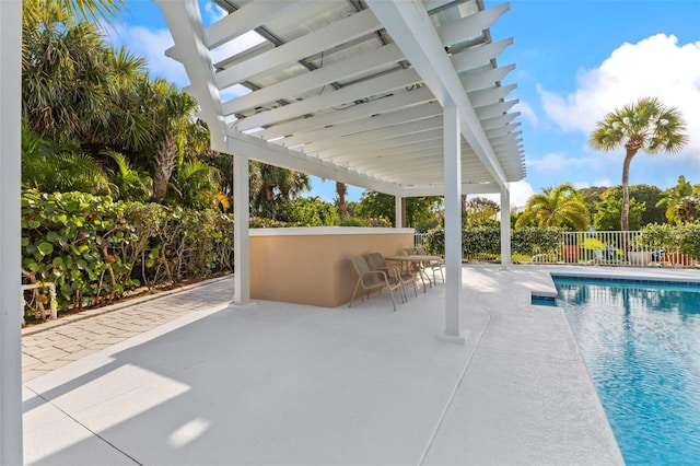 2275 Genesea Ln, Vero Beach, FL 32963 - view of swimming pool featuring a patio and a pergola
