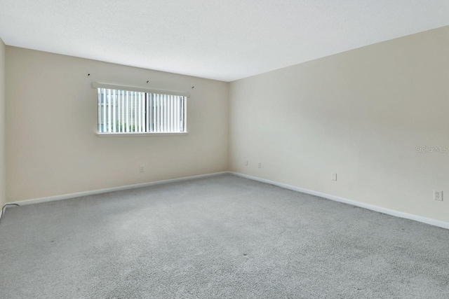 600 N Boundary Ave Unit 110A, Deland, FL 32720 - spare room with carpet and baseboards