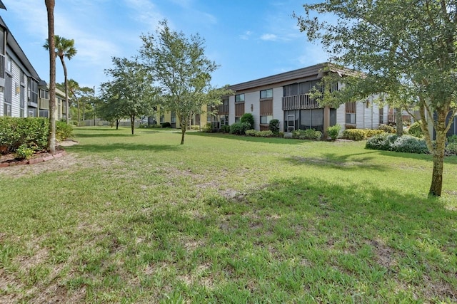 600 N Boundary Ave Unit 110A, Deland, FL 32720 - view of green lawn with a residential view